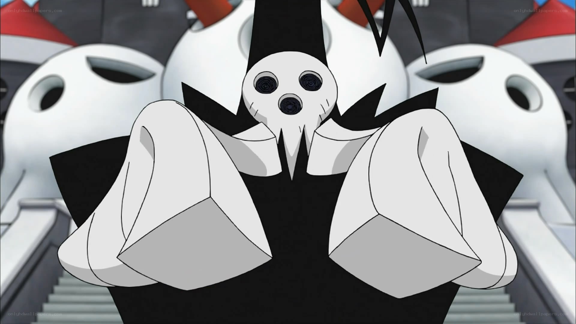 skull-faced character in black robe