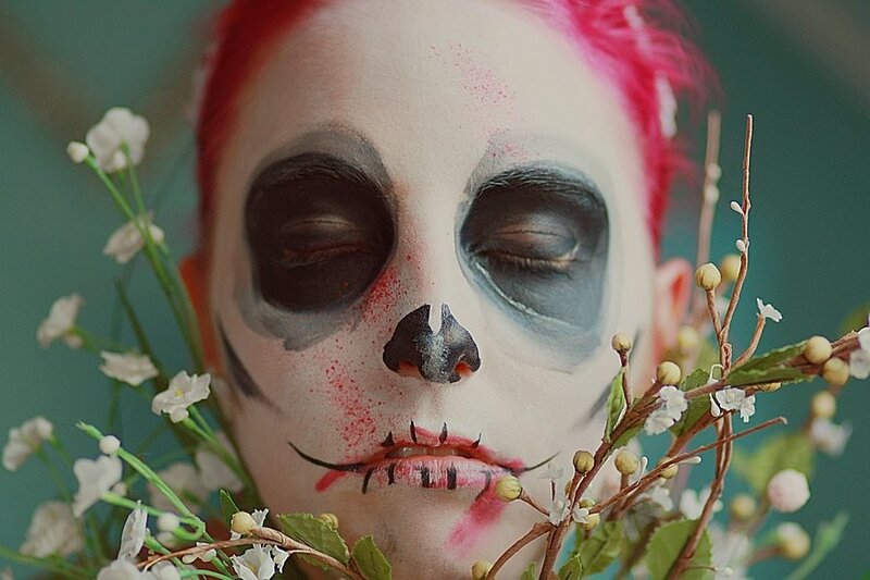 skull makeup with flowers
