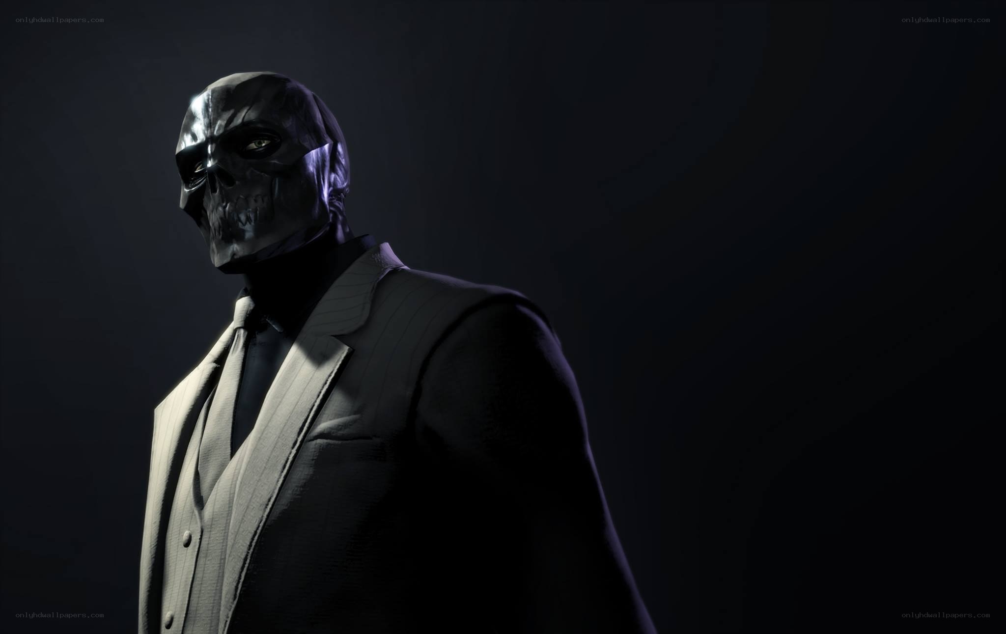 skull-masked man in suit
