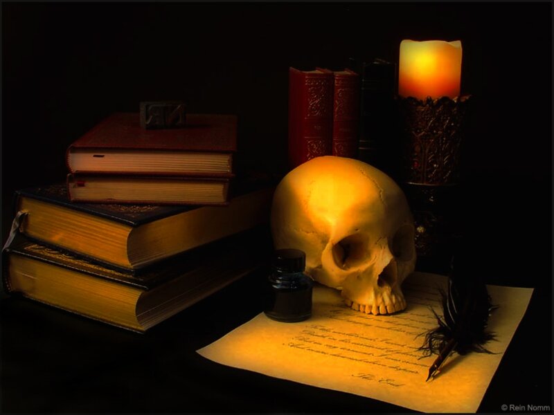 Skull on Desk with Books