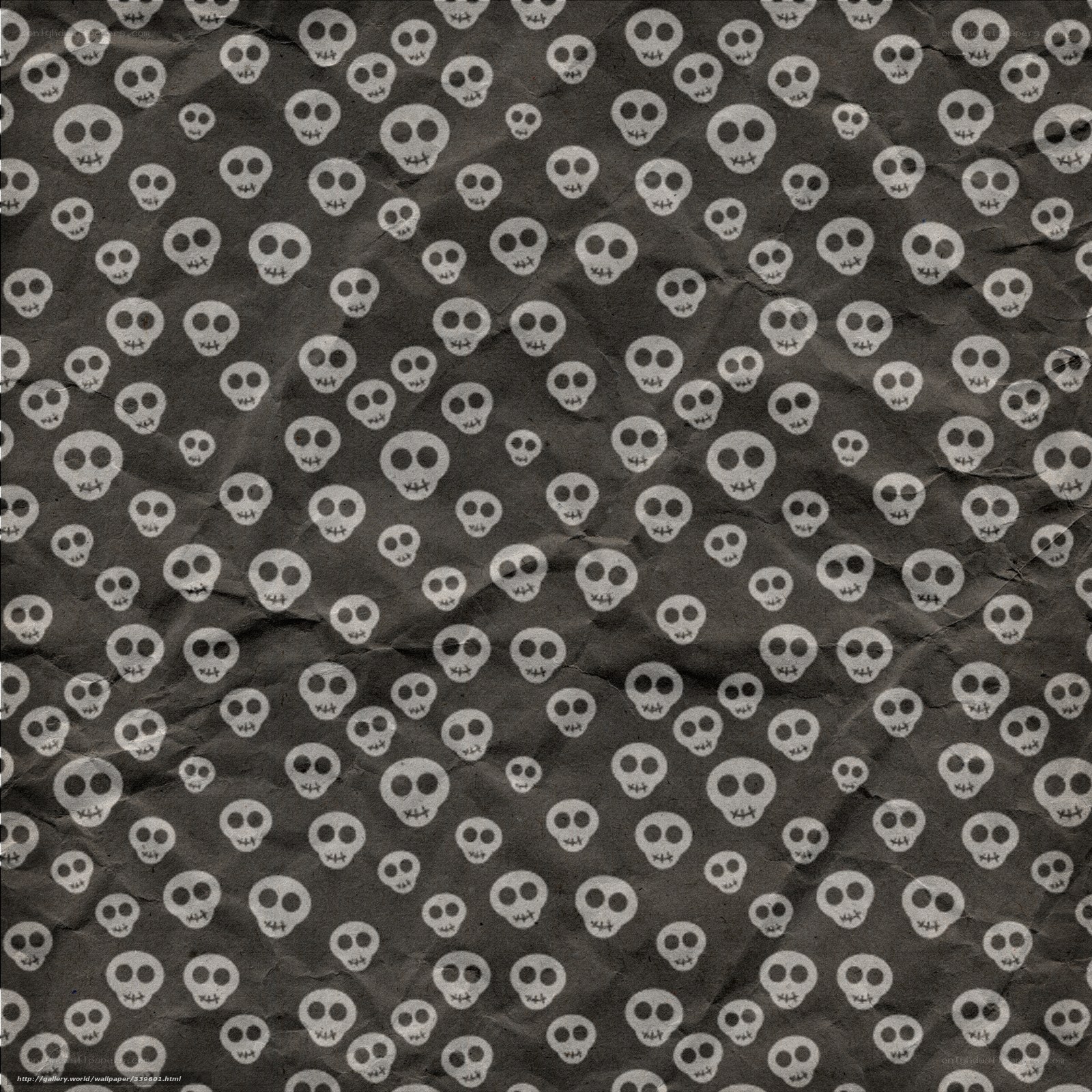 skull pattern on crumpled paper
