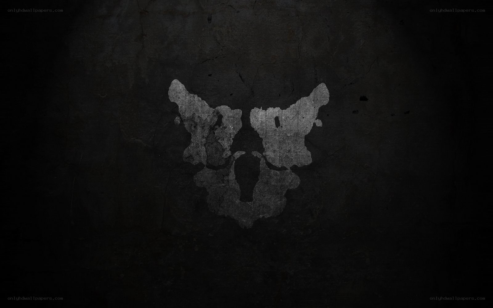 skull symbol on dark wall