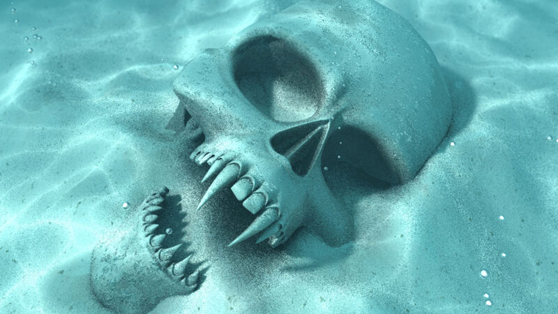skull underwater on sandy seabed