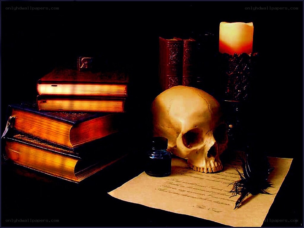 skull with books and candle