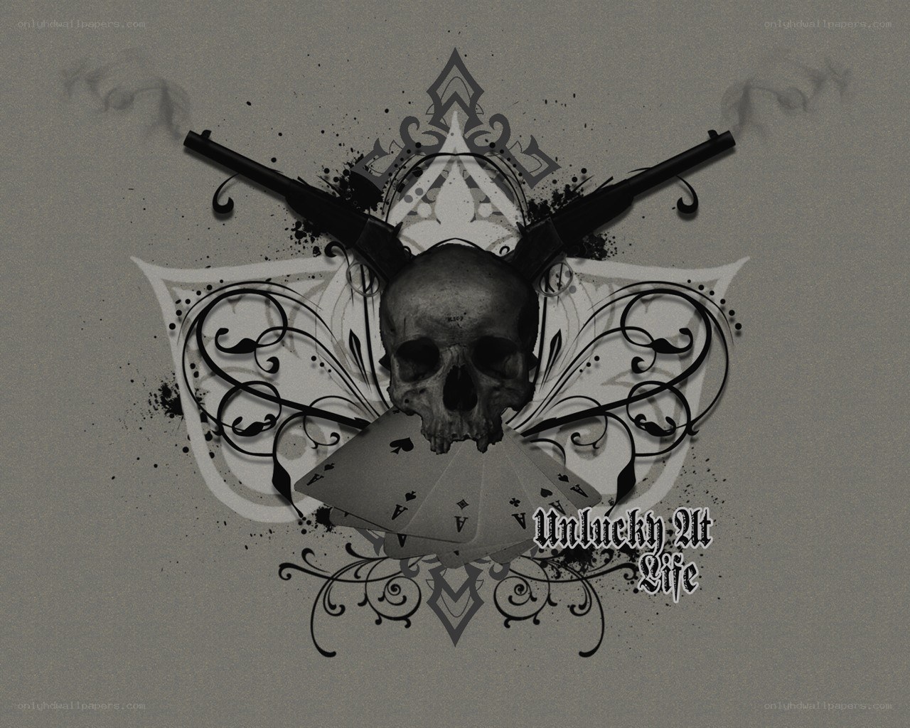skull with guns and cards