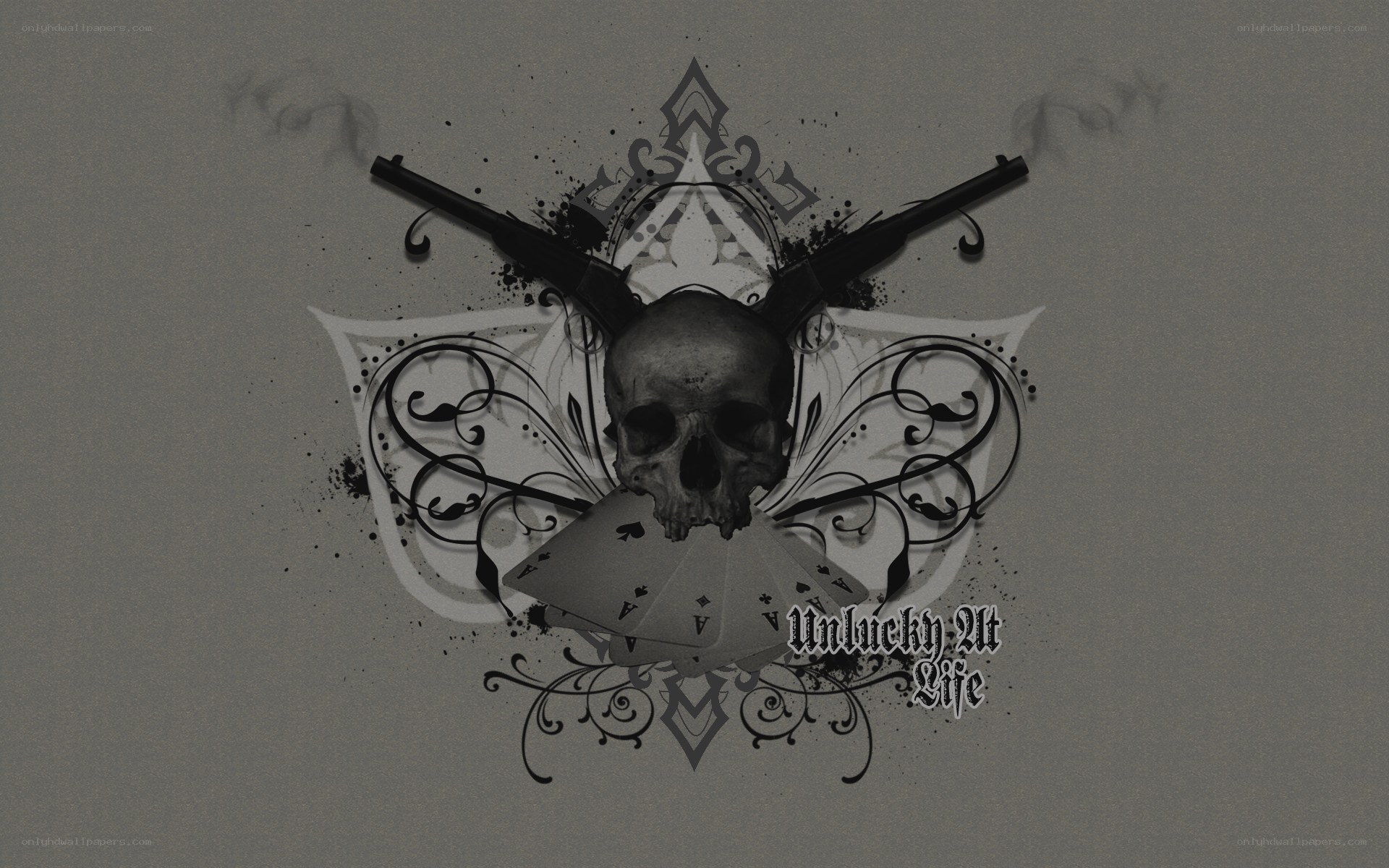 skull with guns and cards
