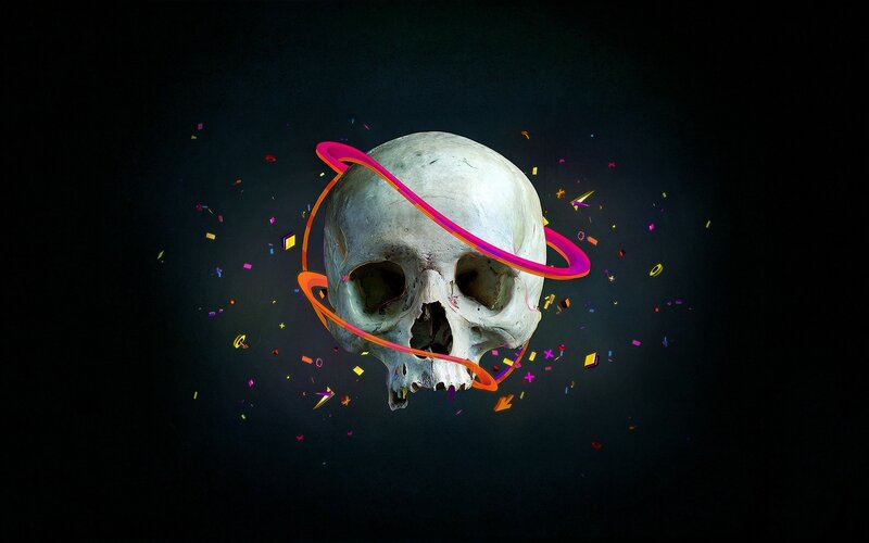 skull with neon rings and confetti