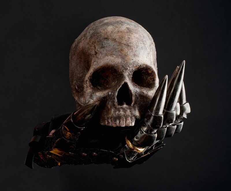 skull with spiked gauntlet