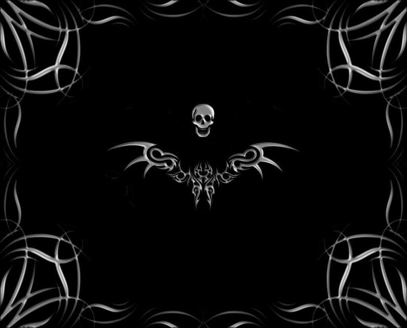 skull with tribal wings