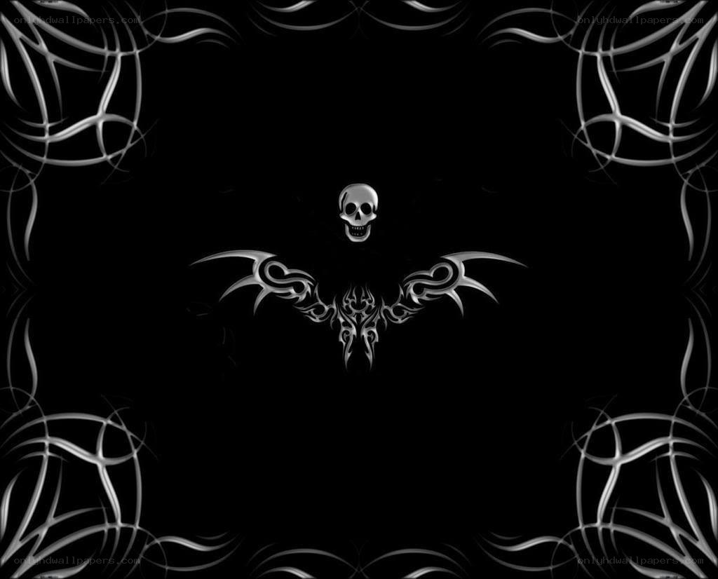 skull with tribal wings