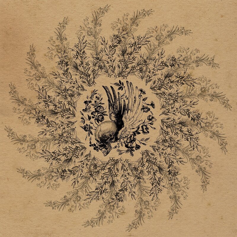 skull with wings and floral wreath