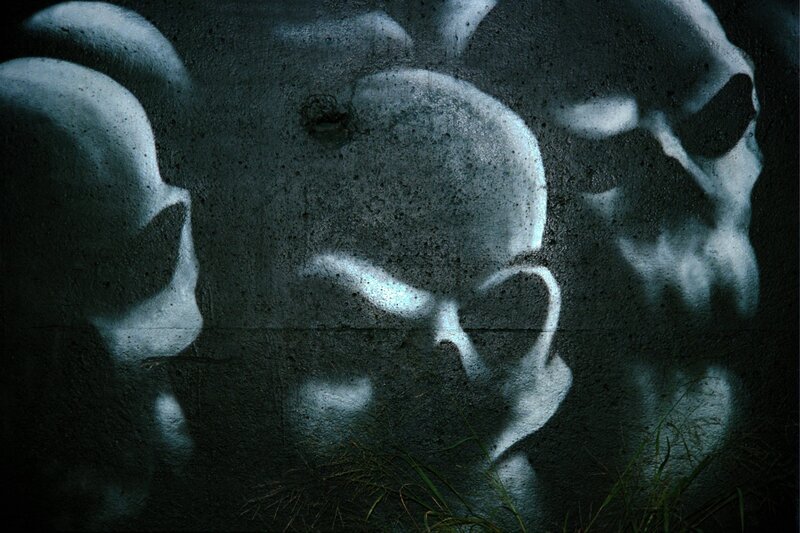 Skulls on Concrete Wall