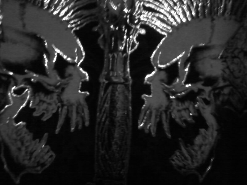Skulls with Wings Sculpture