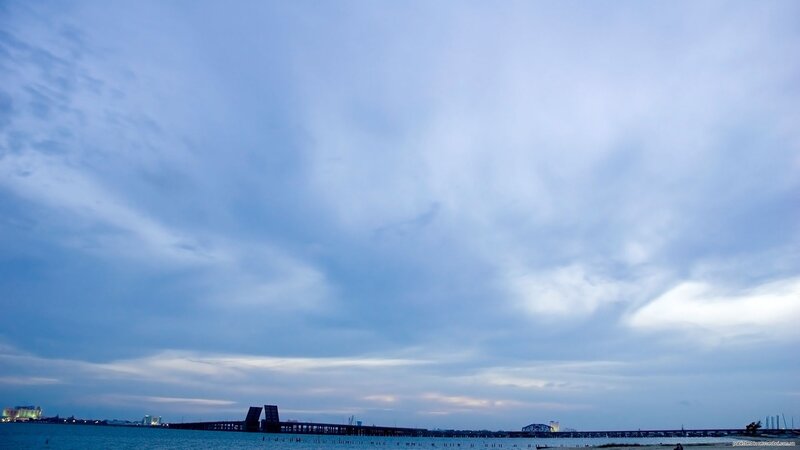 Sky over a coastal bridge
