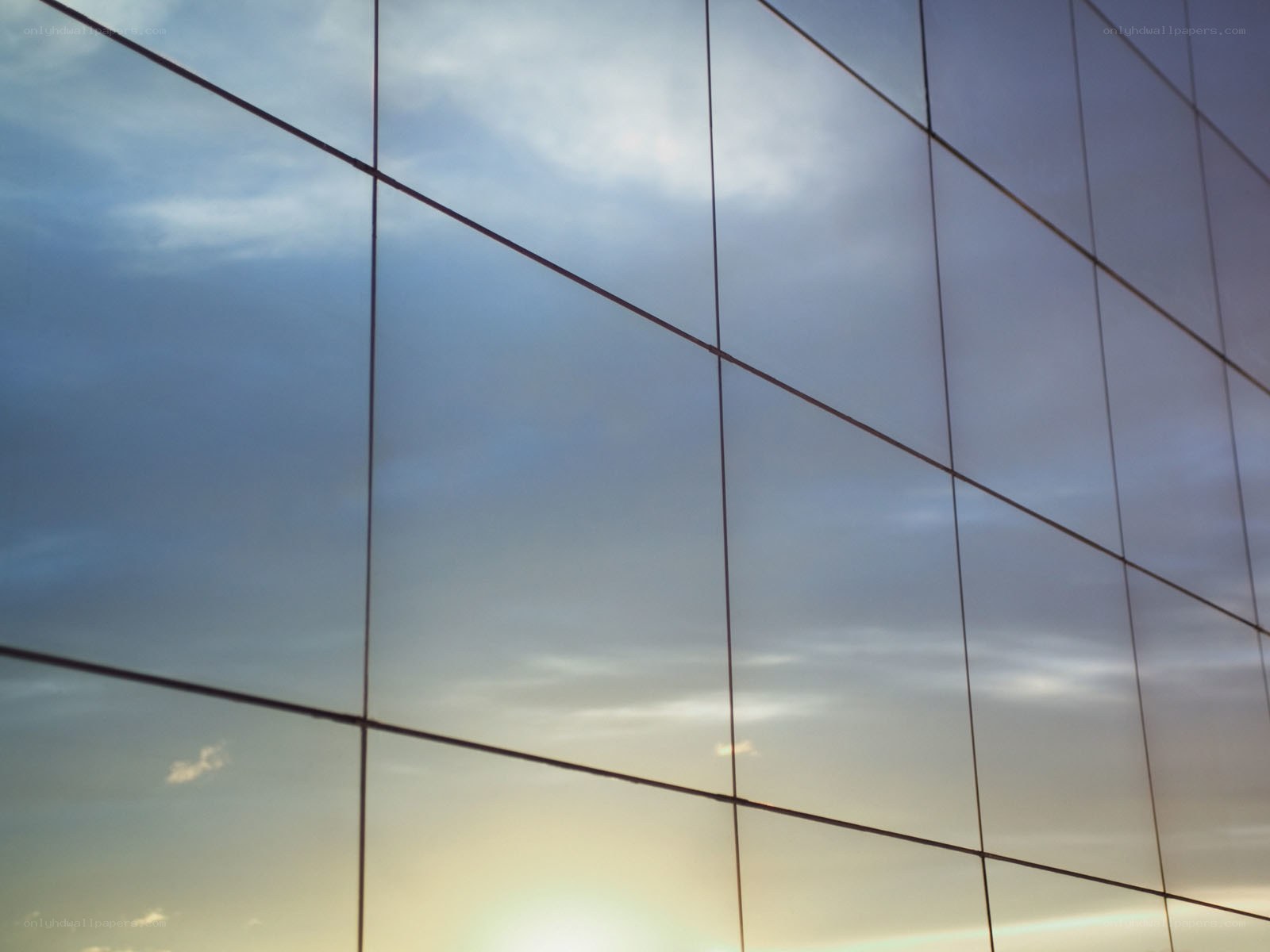 Sky reflected in glass panels