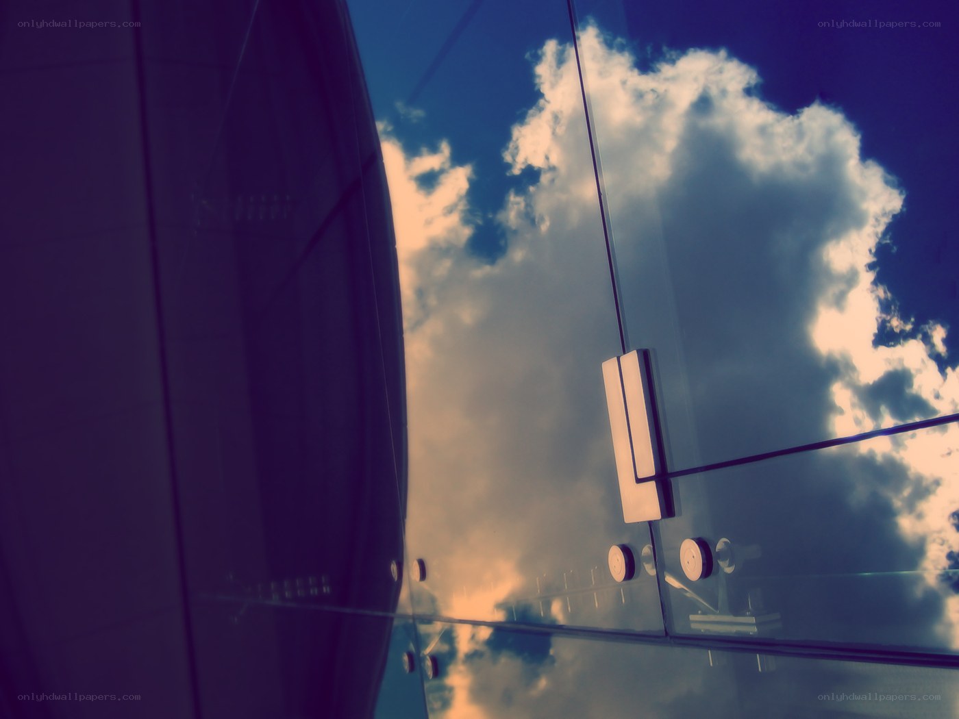 Sky reflected in glass panels