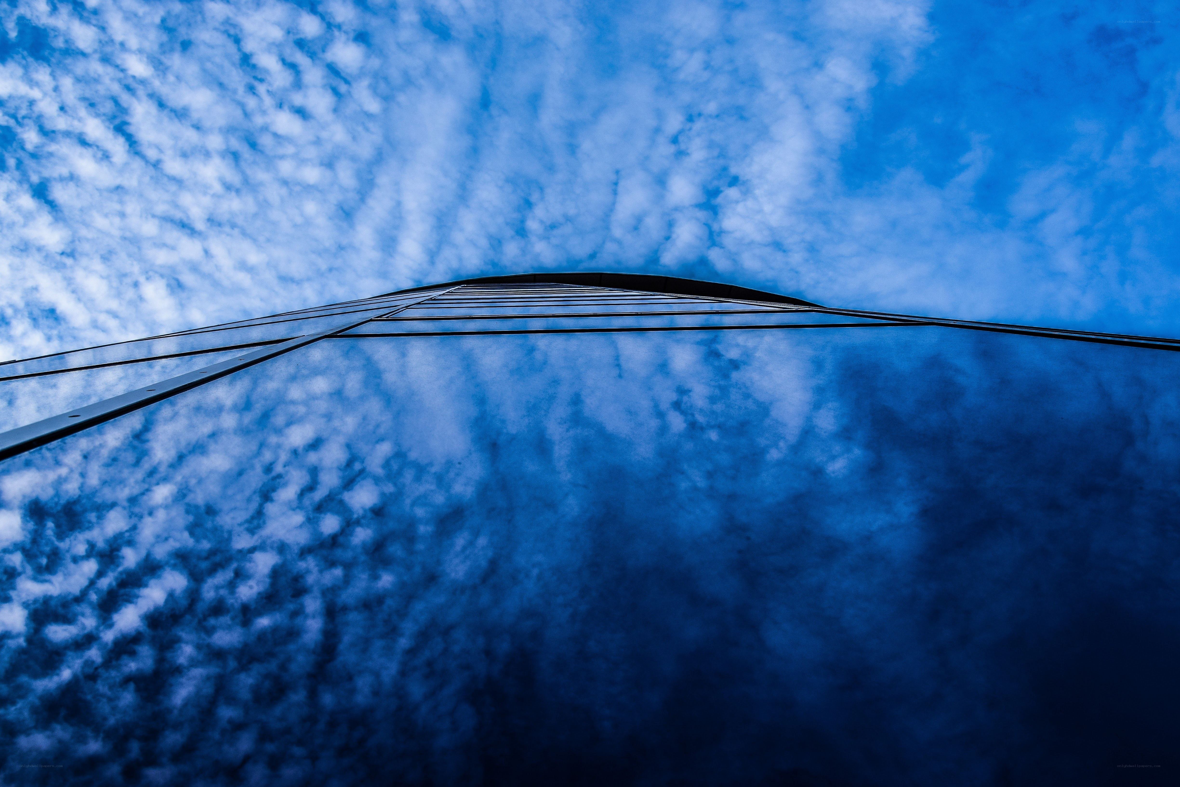 Sky reflected in glass skyscraper
