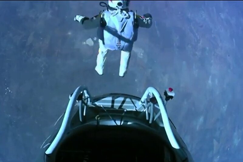 skydiver above aircraft