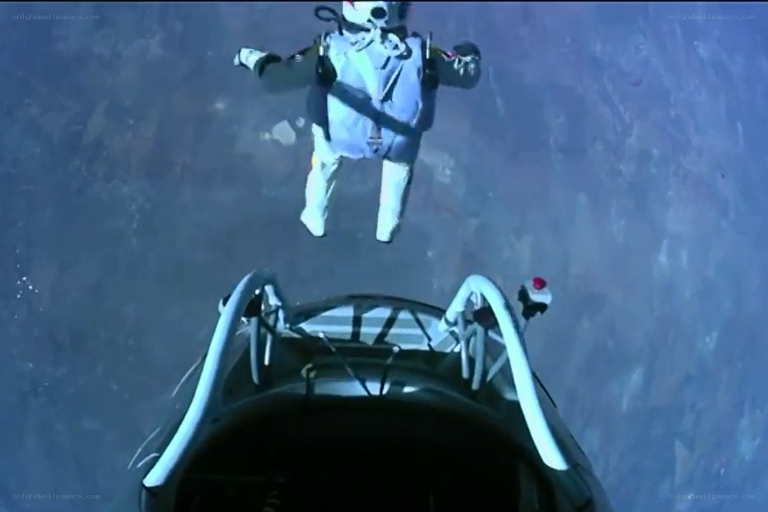 skydiver above aircraft