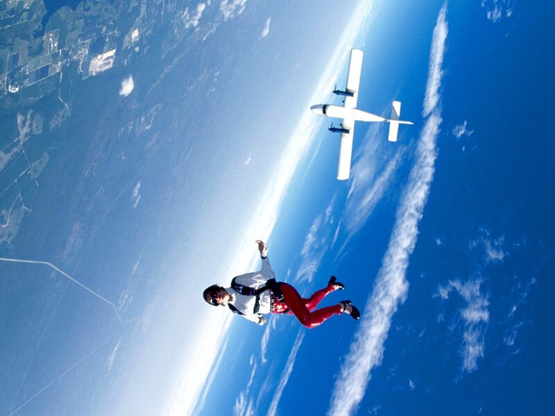 skydiver above the earth