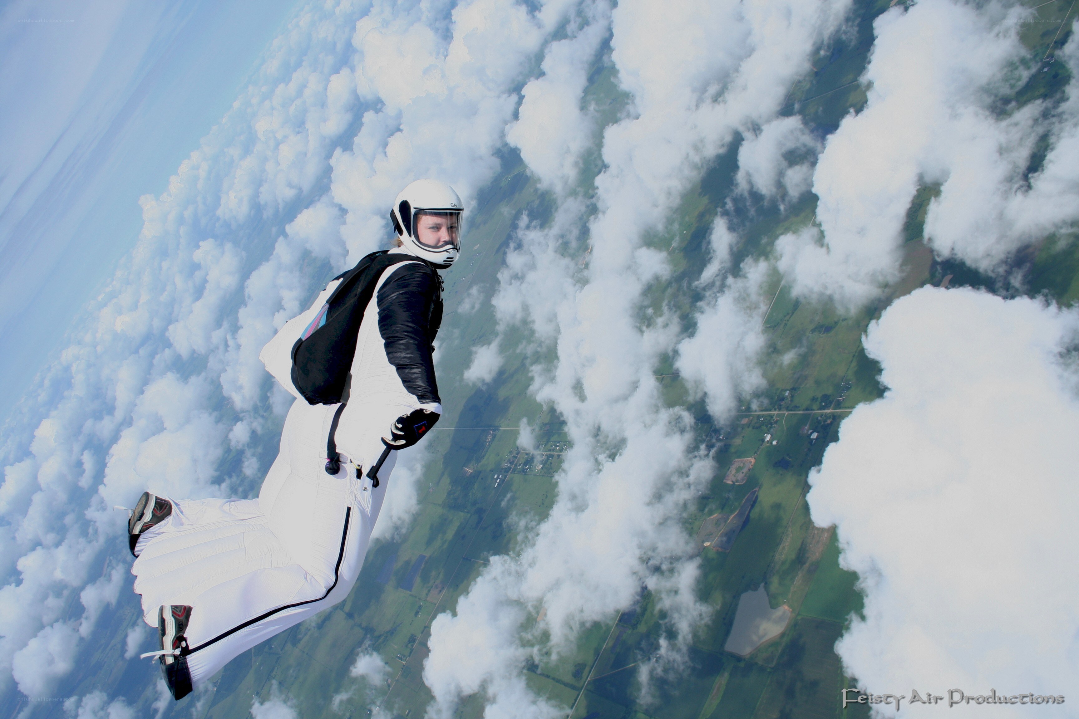 skydiver in white suit