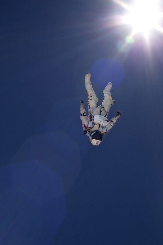 Skydiver in White Suit — Blue, Dramatic, Afternoon, Photograph