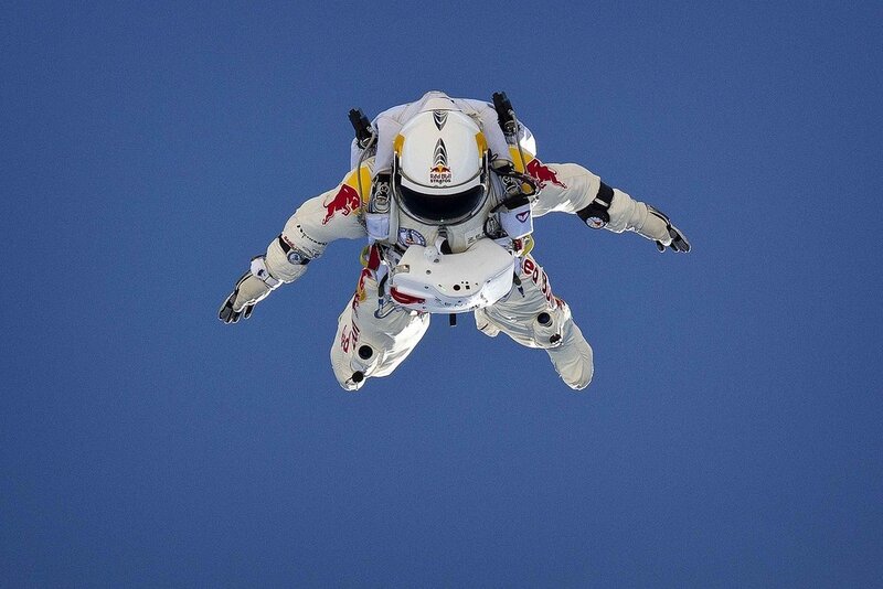 Skydiver in White Suit — Blue, Dramatic, Photograph, Helmet