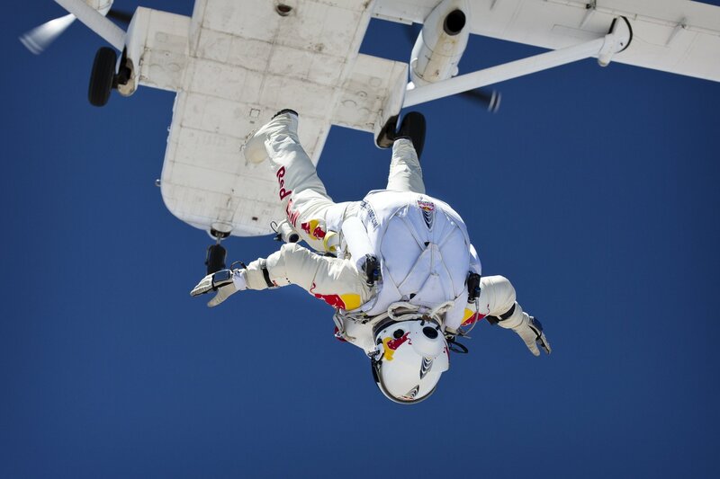 Skydiver in White Suit — Dramatic, Afternoon, Photograph, Airplane