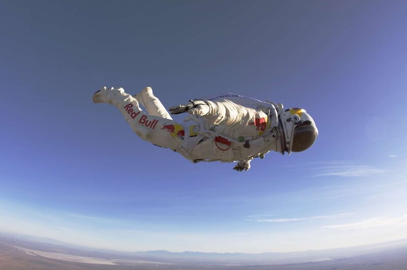 Skydiver in White Suit — Dramatic, Afternoon, Photograph, Space Suit, Helmet, Blue Sky
