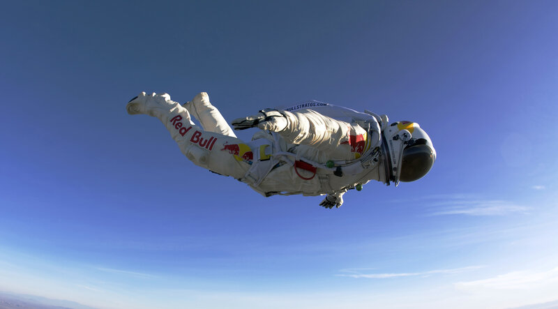 Skydiver in White Suit — Dramatic, Afternoon