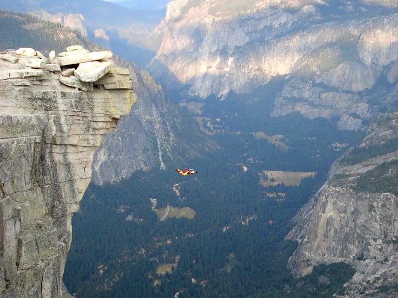 Skydiver over a canyon