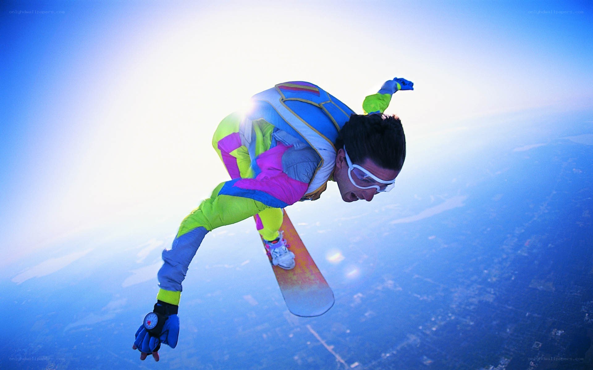 skydiver with snowboard