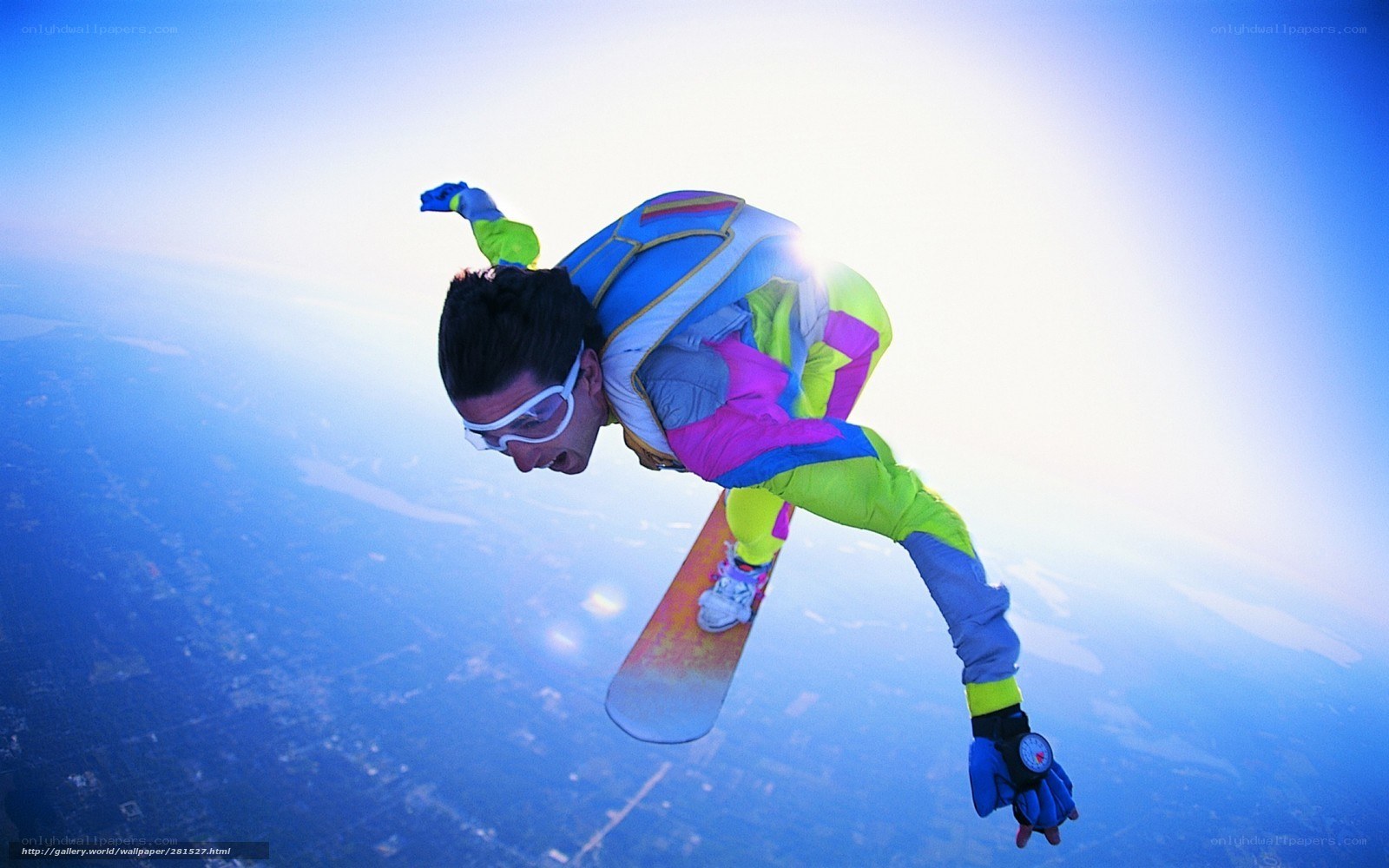 skydiver with snowboard