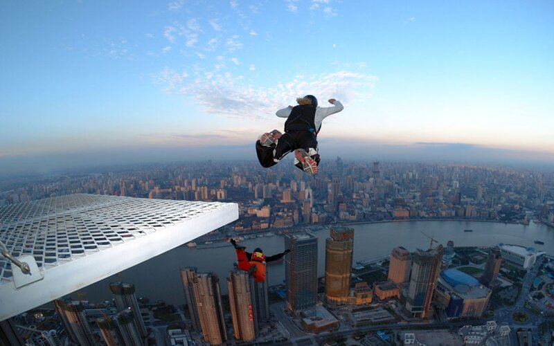 Skydivers Above City