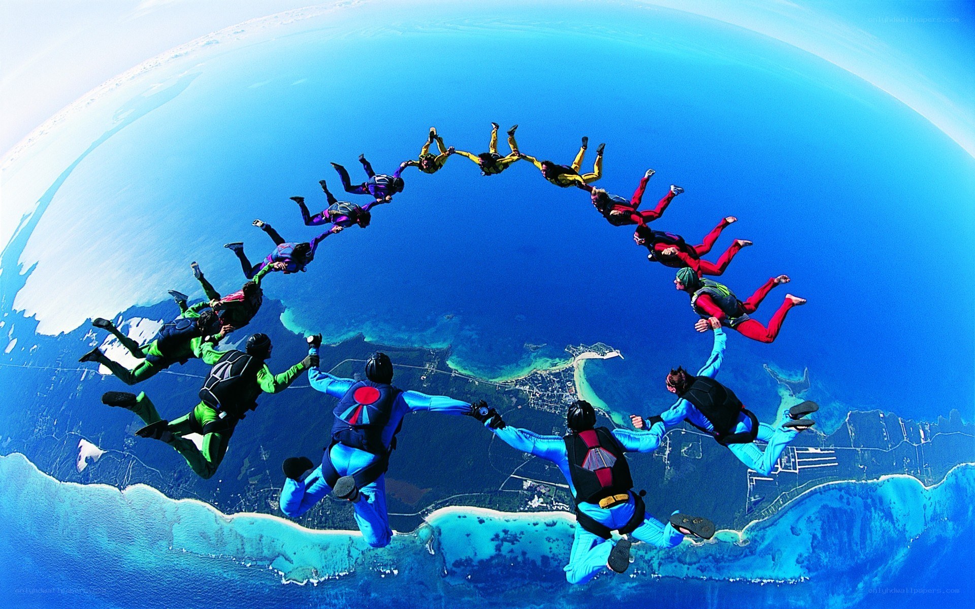 Skydivers forming a circle