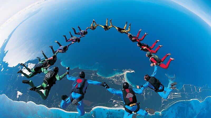 Skydivers forming a circle