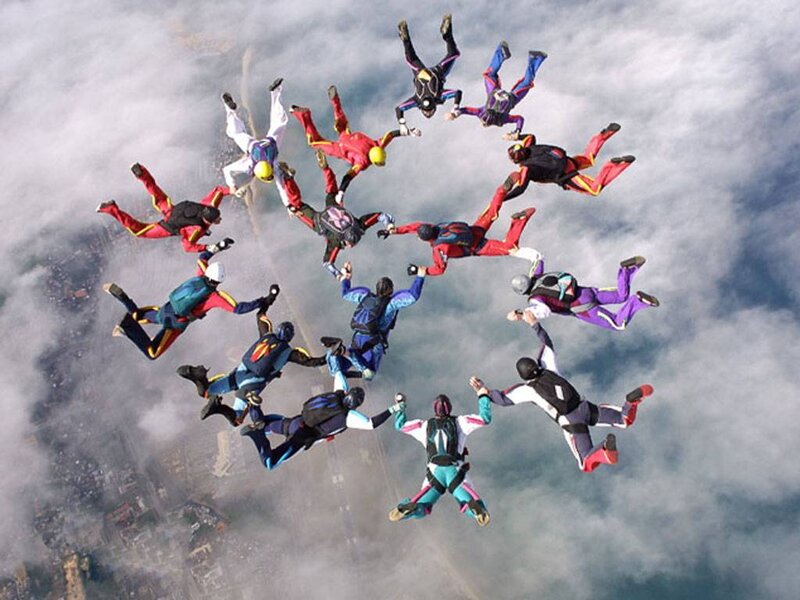 Skydivers forming a circle