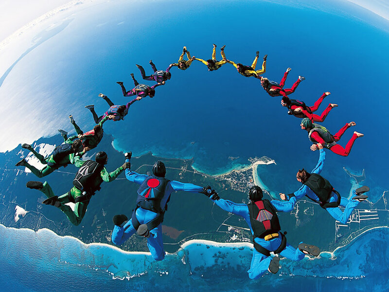 Skydivers forming a circle