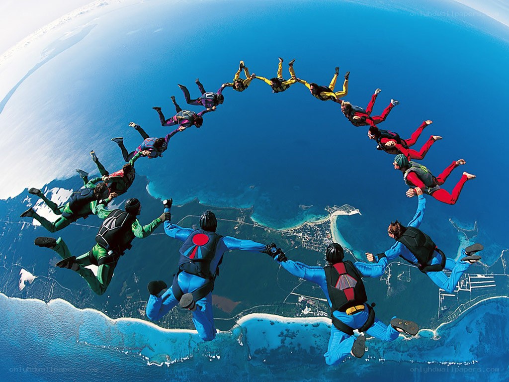 Skydivers forming a circle