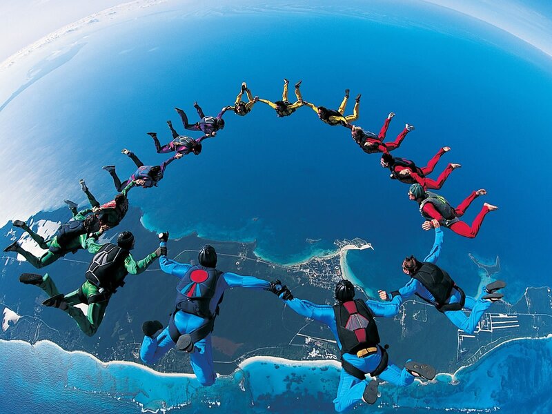 Skydivers forming a circle