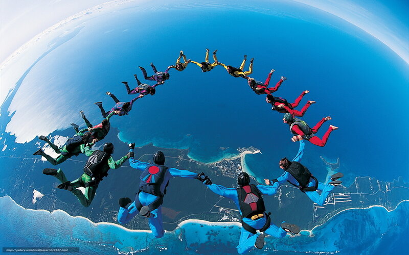 Skydivers Forming Circle — Blue, Dramatic, Afternoon, Photograph, Ocean