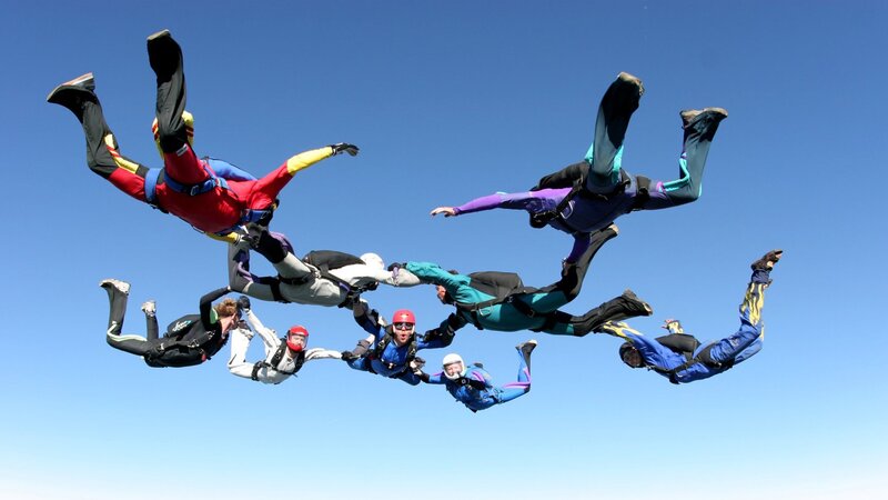 skydivers in formation