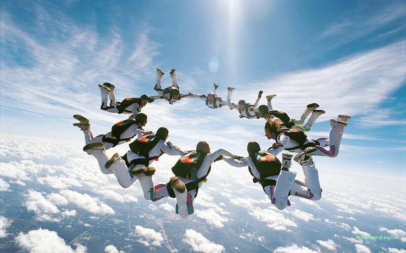 Skydivers in Formation — Blue, Dramatic, Afternoon, Photograph, Clouds