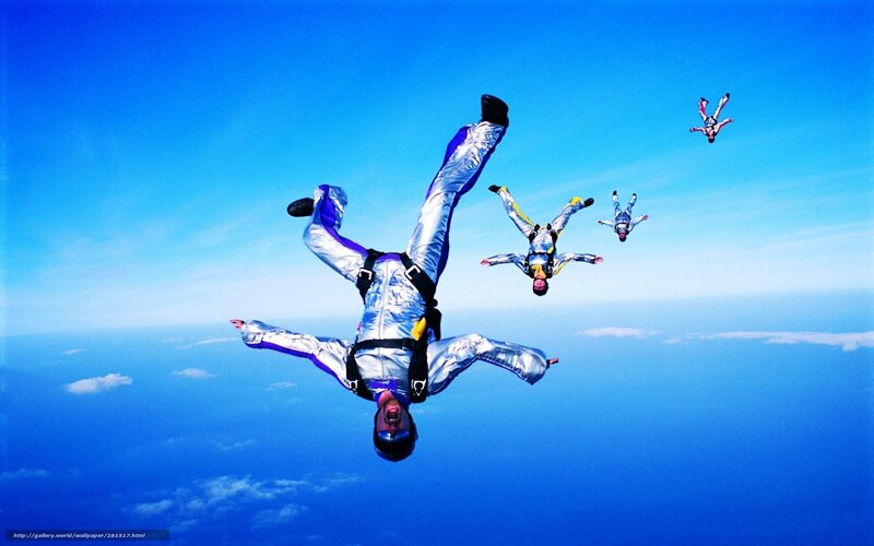 Skydivers in Formation — Blue, Dramatic, Photograph