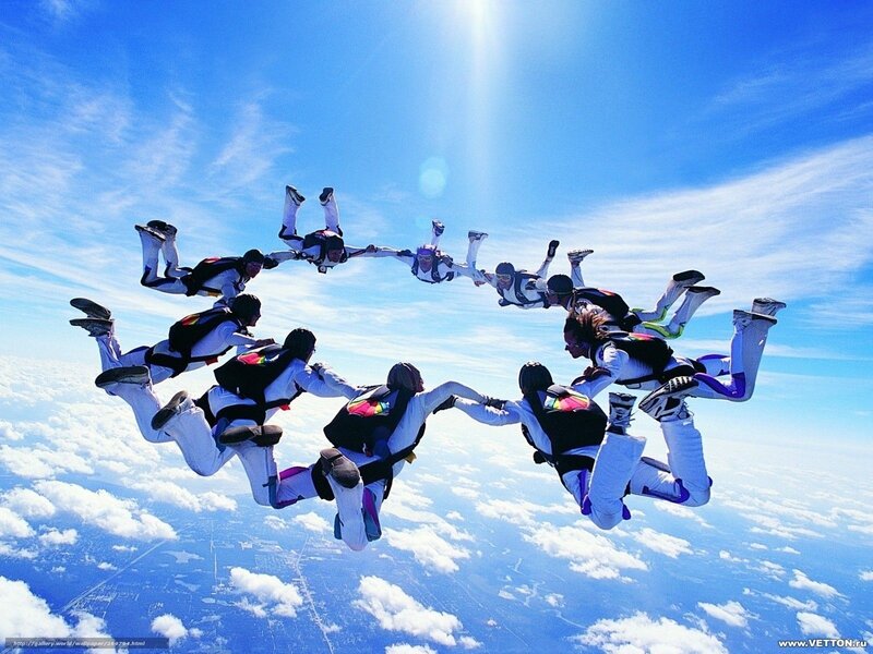Skydivers in Formation — Blue, Dynamic, Afternoon