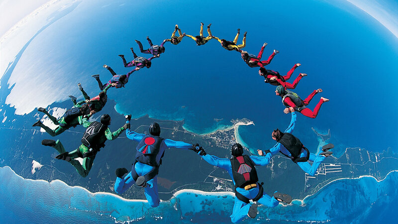 Skydivers in Formation — Blue