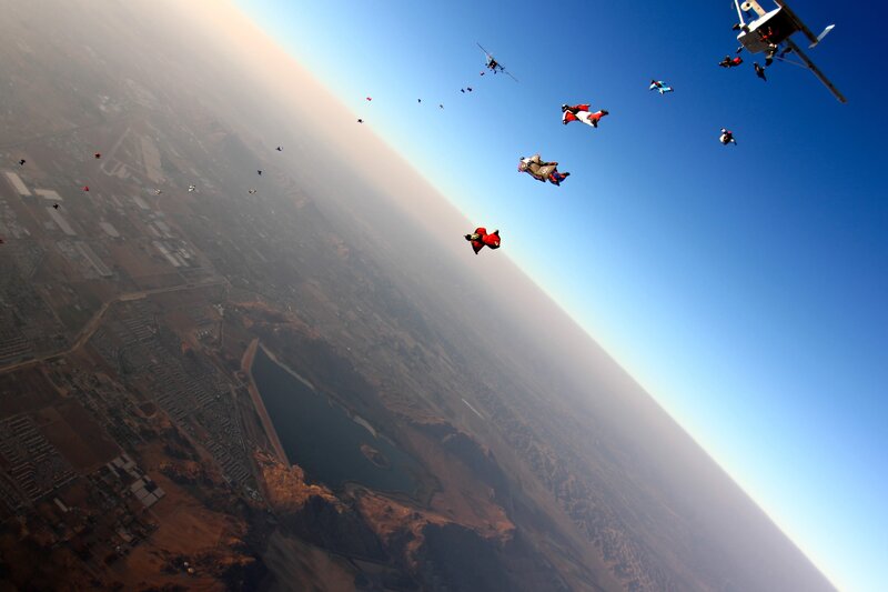 Skydivers in Freefall — Blue, Dramatic