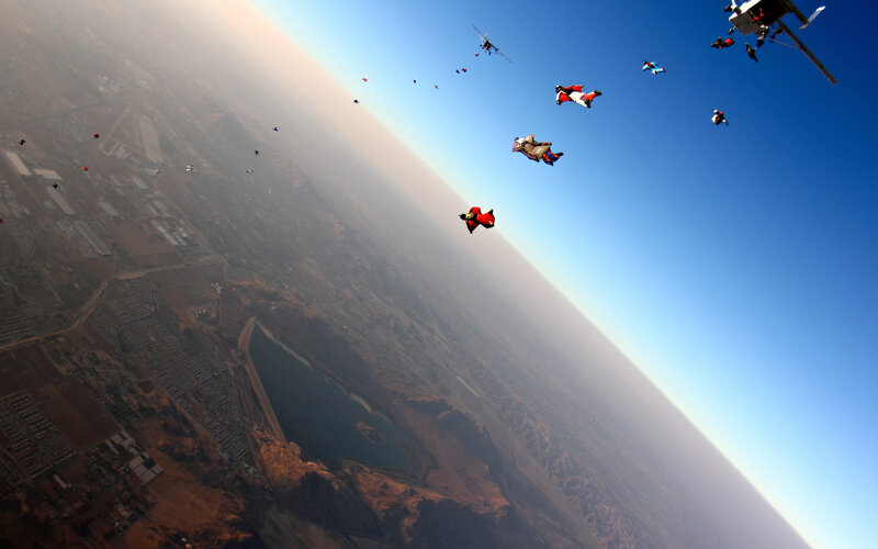 Skydivers in Freefall — Blue
