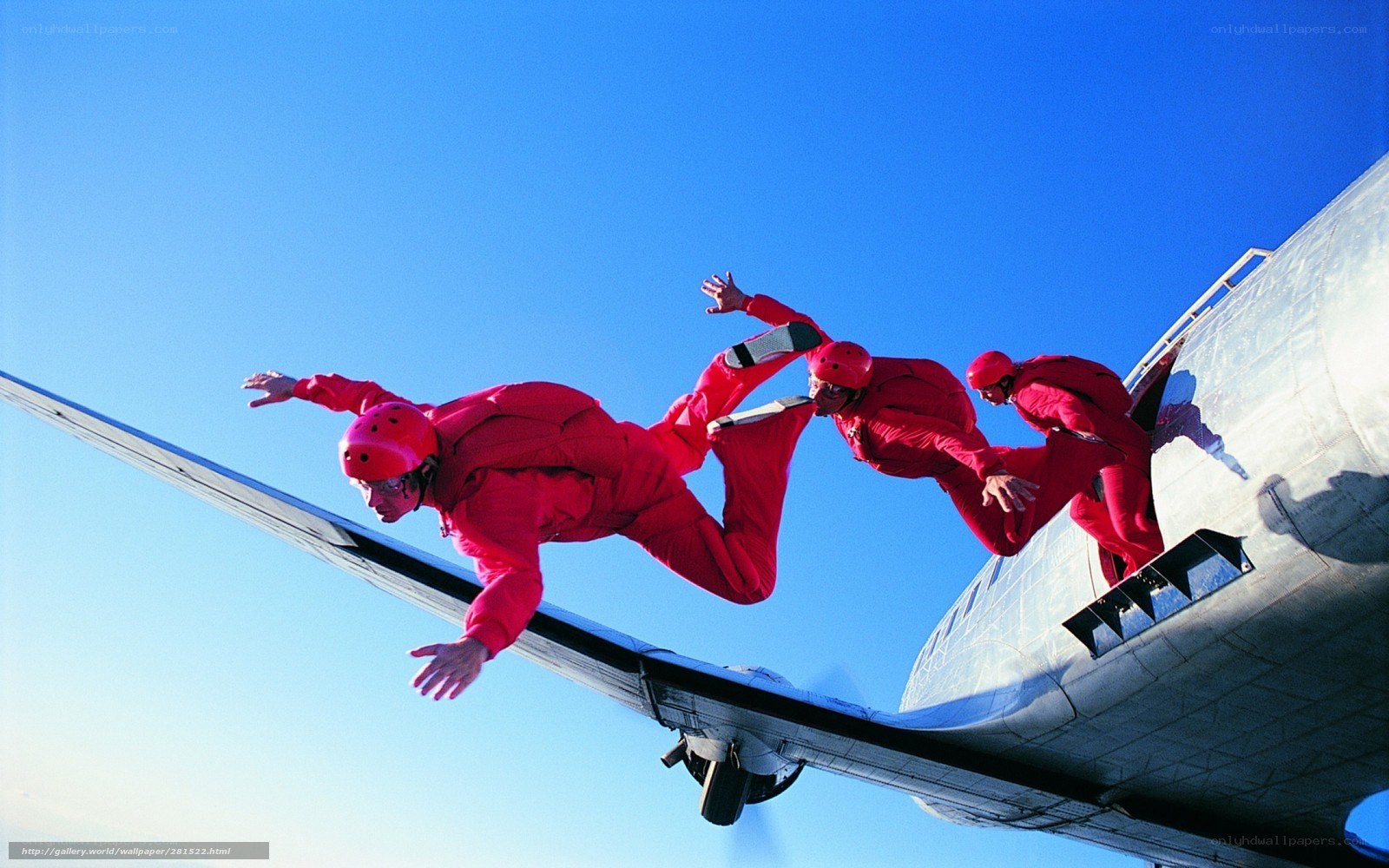 Skydivers jumping from airplane