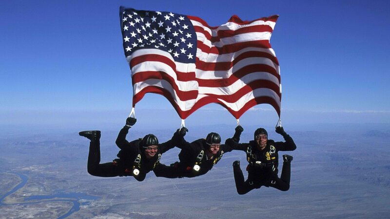 Skydivers with American flag
